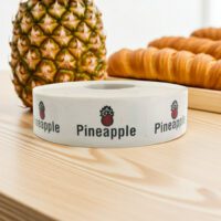 pineapple sticker on a white label with a picture on a pineapple