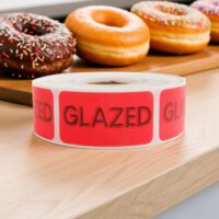 glazed label on a rectangle red label with black text